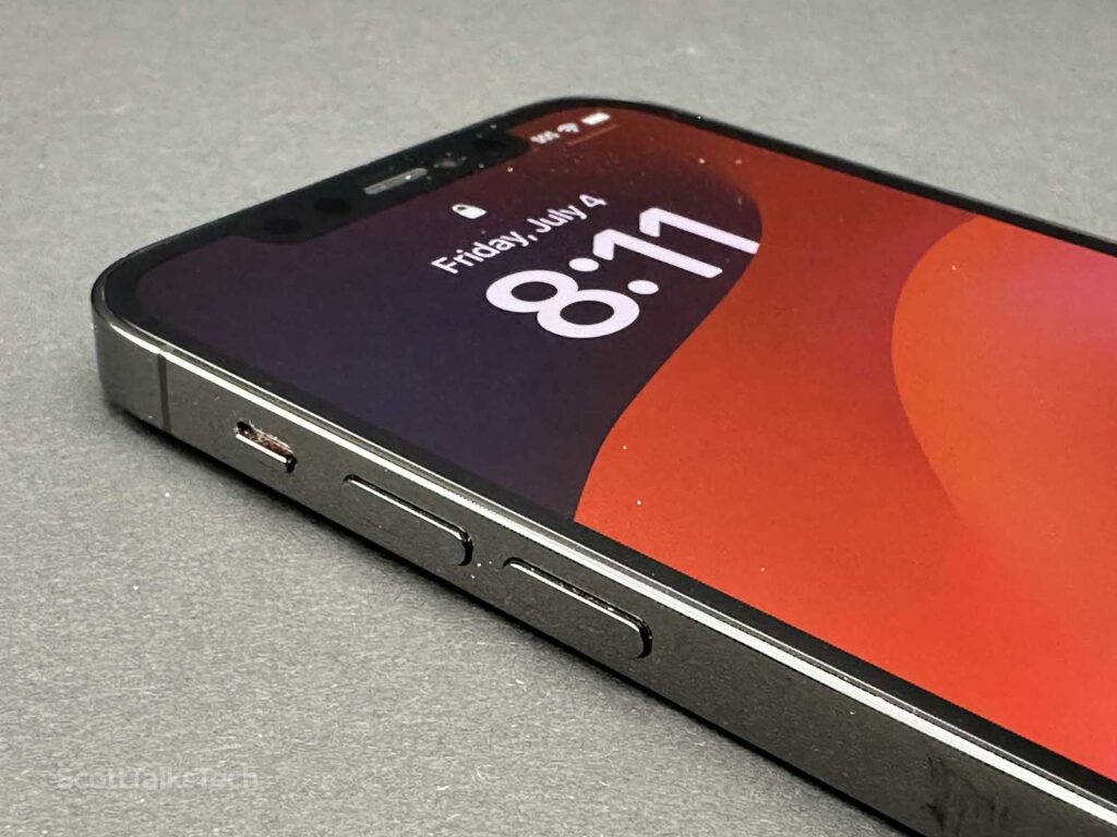 Space gray Apple iPhone 12 Pro side rail detail showing volume buttons and mute switch
