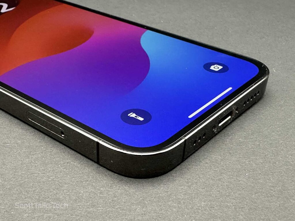Space gray Apple iPhone 12 Pro Close up showing bottom speakers and lightning port