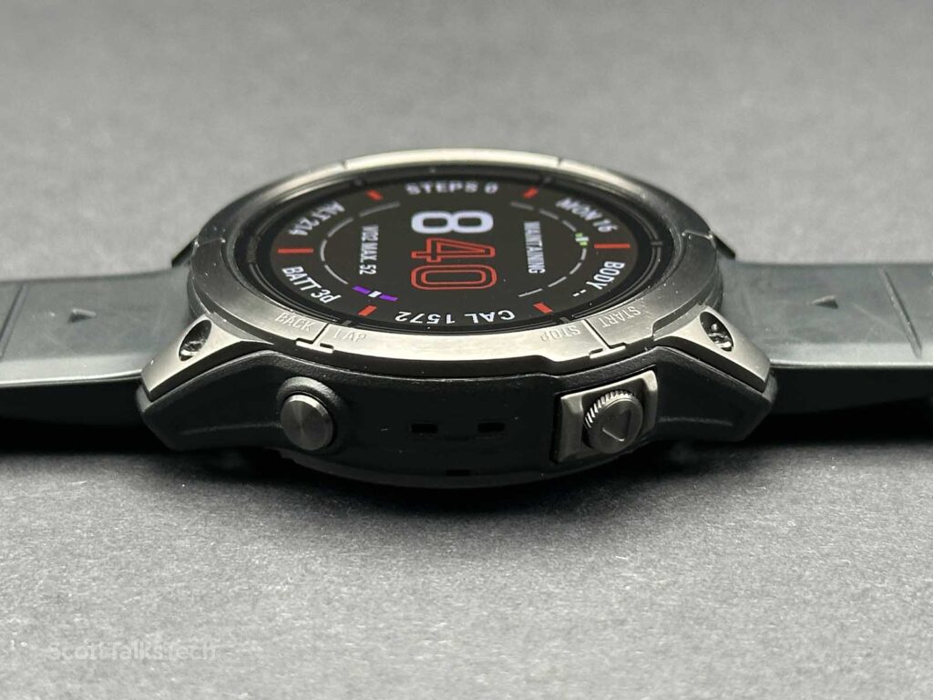 Garmin Epix Pro (Gen 2) 47mm lying face up showing speaker holes on side