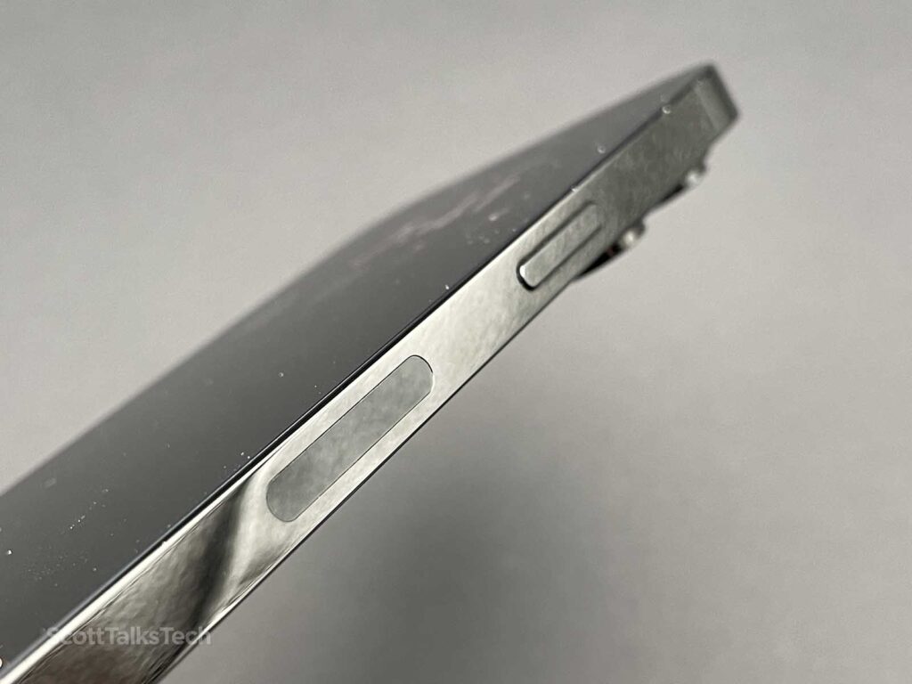 Space Black iPhone 14 Pro side rail showing SIM card door