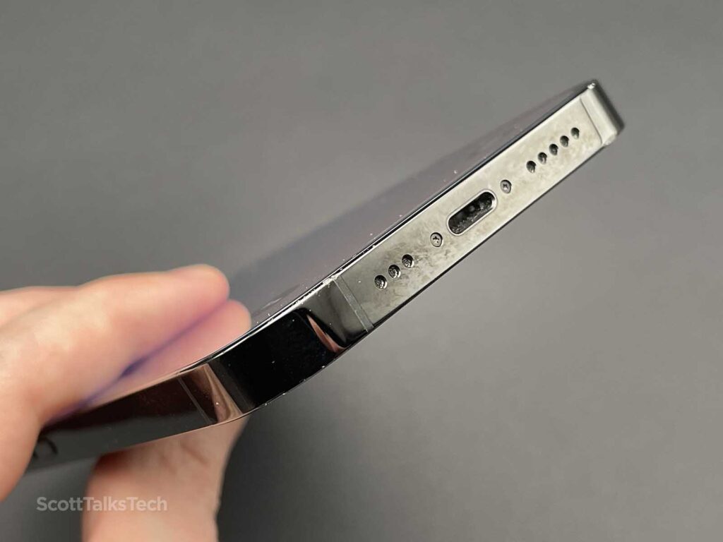 Space Black iPhone 14 Pro bottom showing lightning port and speaker holes