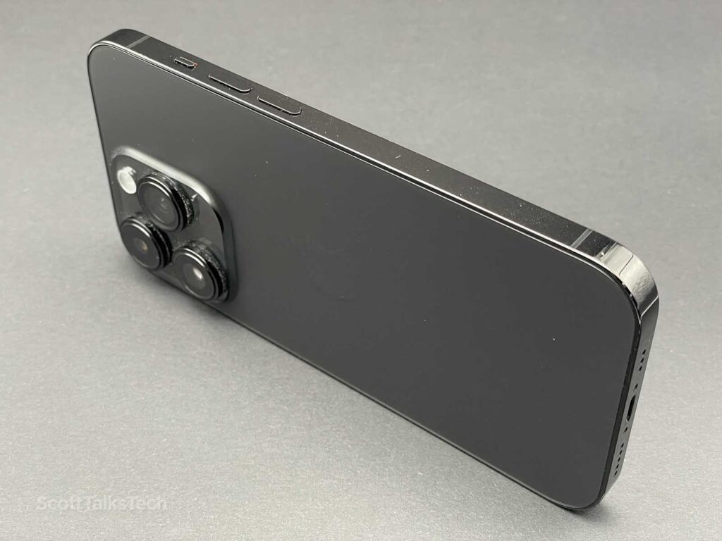 Space Black iPhone 14 Pro lying on its side